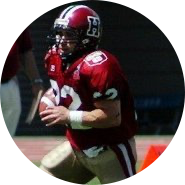 Nick Palazzo running with the football for Harvard
