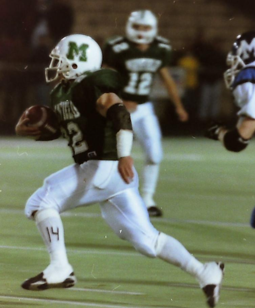 Nick Palazzo (#22) breaking away on a run for Mayfield High School